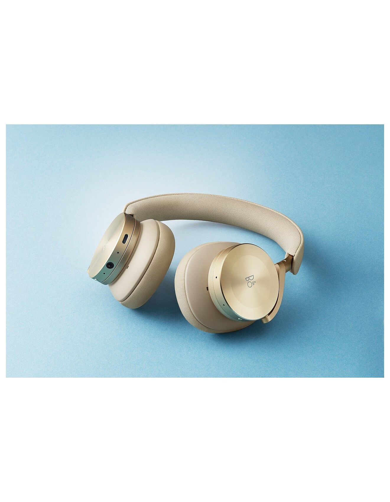 Bang & Olufsen Beoplay H95 Noise Cancelling Headphones (Gold Tone) B&O Headphones Premier Hifi 5 H95 Headphones with blue background